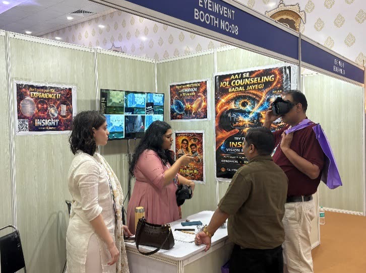 The AKSightXR EyeInvent booth at AIOC 2026 with a delegate trying the headset